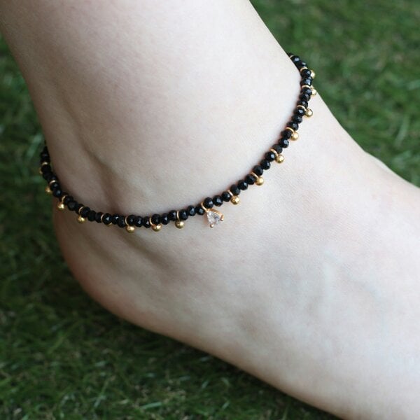 The Colourful Aura Black beaded gold dangle slim nazar payal anklet