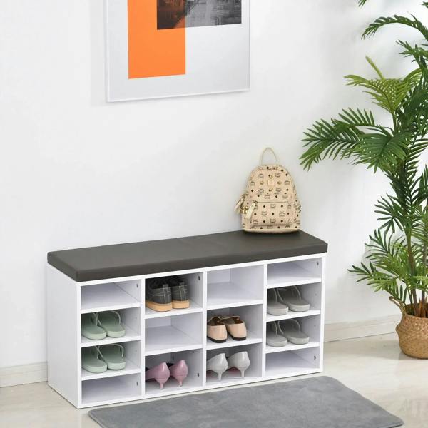White 14-compartment shoe rack bench with dark cushioned top and organized shoe cubbies