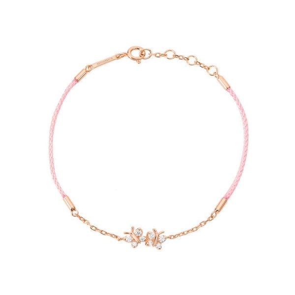 BLOOMTINE Enchanting Flutterfly rose gold butterfly bracelet in 14K rose gold vermeil. A pink silk cord bracelet featuring two iddy biddy moissanite butterflies designed as a luxury friendship bracelet. Enchanting Flutterfly™ Rose Gold Vermeil Silk Cord Butterfly Bracelet