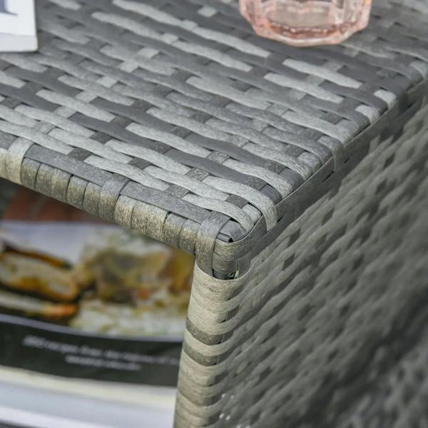 Grey wicker rattan coffee table corner with rounded edge and tight weave