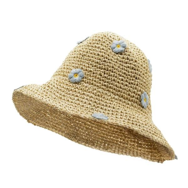 Beige straw sun hat with wide brim and light blue flower applique