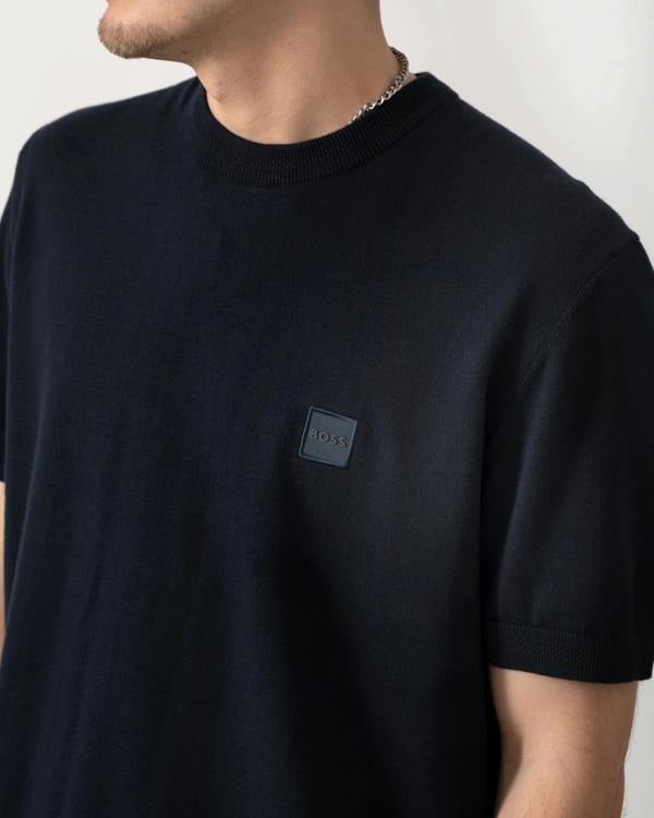 logo detail shot of a BOSS Orange Kanacho Mens T-Shirt in Dark Blue 404