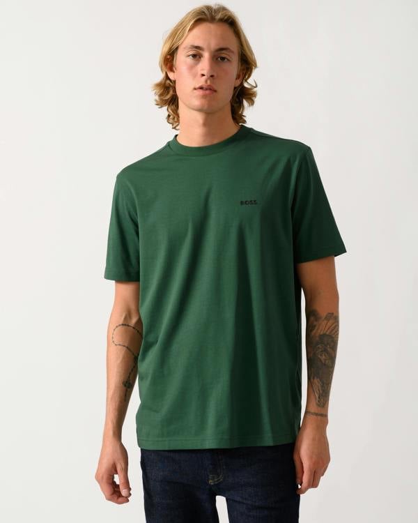 model wearing a BOSS Green Tee Mens Stretch Cotton T-Shirt with Contrast Logo in Open Green 365
