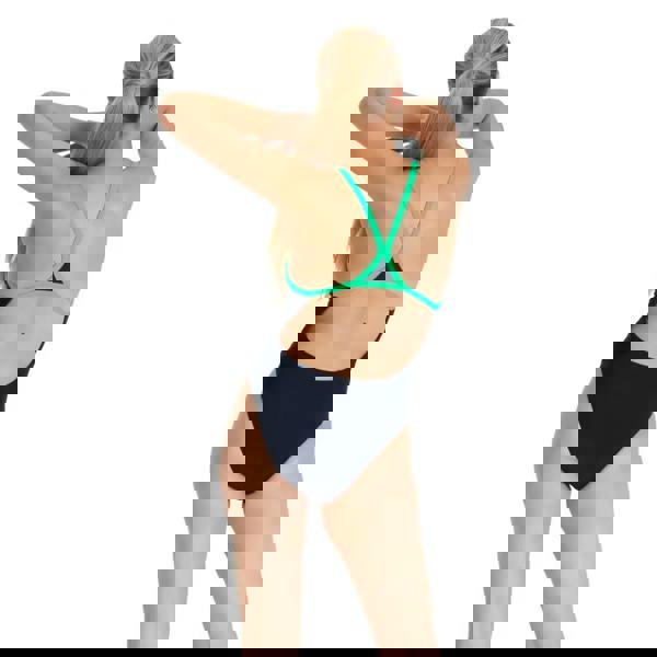 Speedo Hyperboom Turnback swimsuit in navy blue with green accents and crisscross back