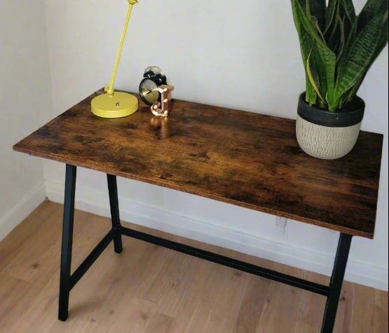 VASAGLE industrial-style computer desk with rustic brown top and black steel frame, 100 cm wide, ideal for home office or study

