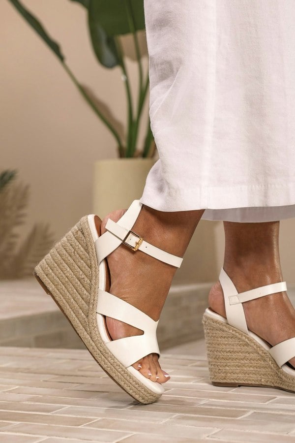 Where's That From Sansa Wide Fit Cut Out Strap Detail Wedge Shoes With Buckle Closure in White Grain Pu