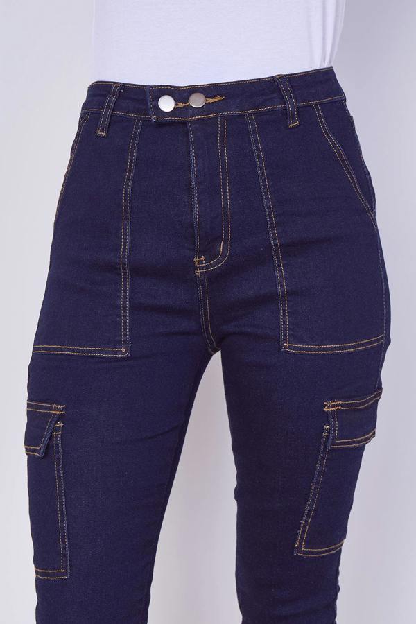 Dark blue jeans with multiple pockets on a white background