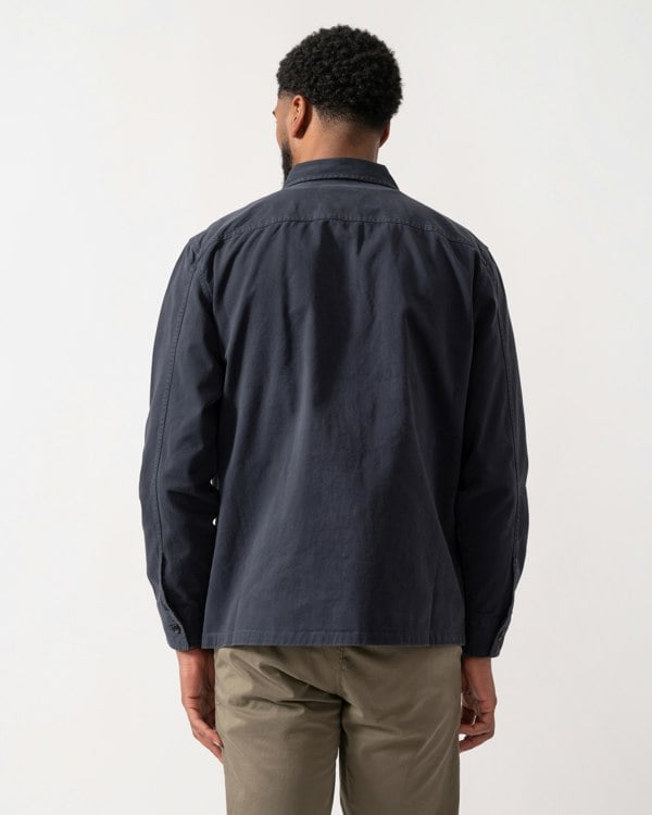 back shot of a model wearing a BOSS Orange Lovel Mens Zip Overshirt in Dark Blue