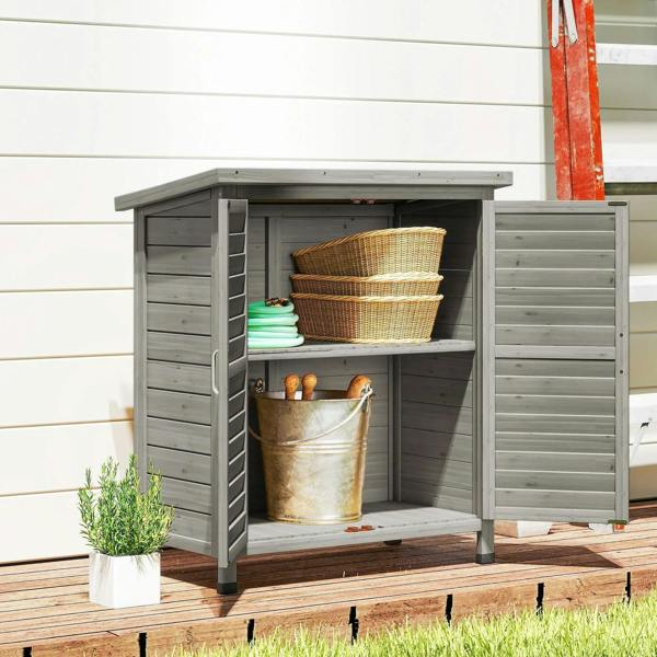 Grey wooden garden shed with both doors open, storage shelves and baskets
