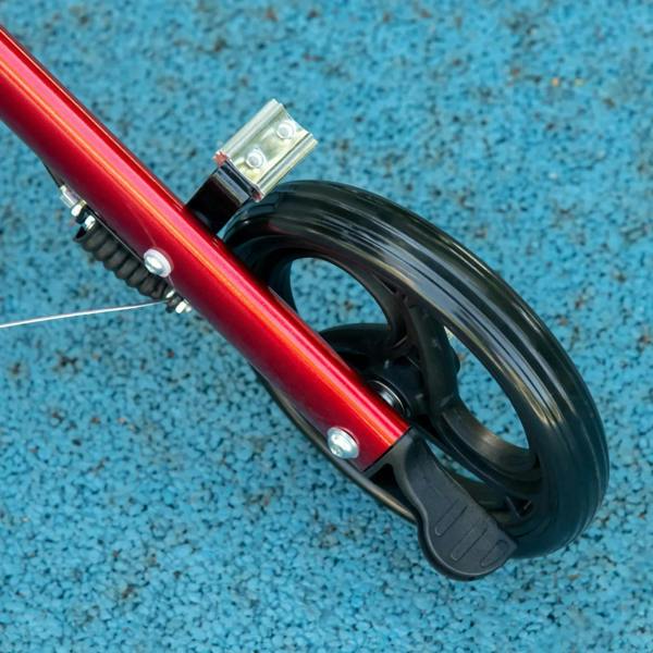 Red folding rollator walker wheel and red frame with black handbrake grip