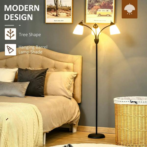 Black tree-style floor lamp with three lit adjustable heads and white shade cones