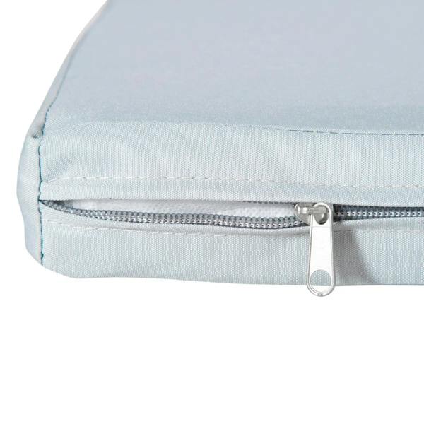 Grey cushion cover detail with zipper track and metal pull tab