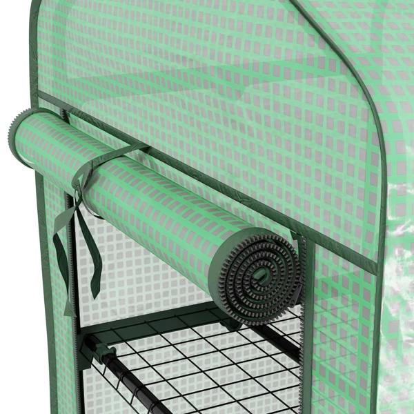 Green greenhouse roll-up door mechanism with bar and tie cord over black wire shelves