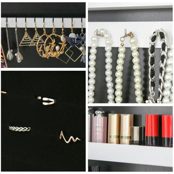 Jewelry storage inside white mirrored cabinet with hooks, ring loops, and earring displays