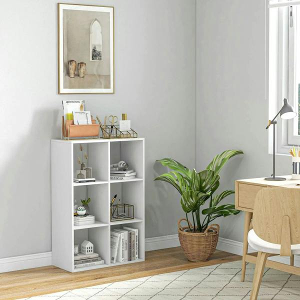 White 6-cube bookshelf with open storage cubbies, styled with books and decor