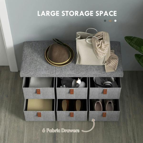 Light grey shoe storage bench with open drawers showing 6 compartments beneath cushioned seat