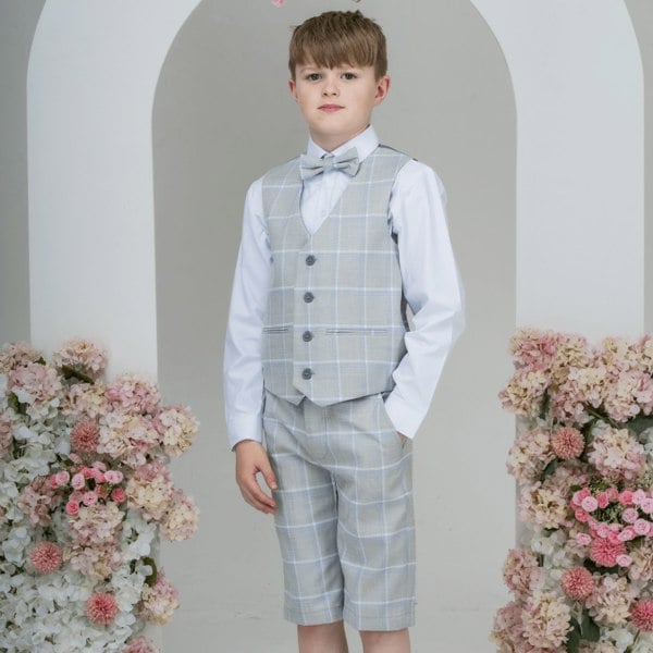 young boy wearing smart check suit