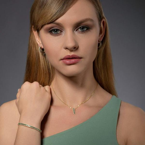 Gold Cuff Bangle Bracelet with Green Cubic Zirconia Stones - namana.london