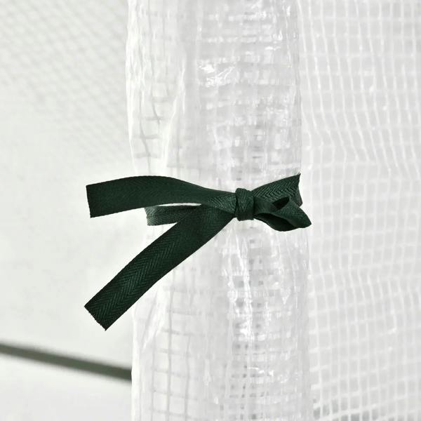 PE cover fastening bow on mini greenhouse, white fabric with dark green ties