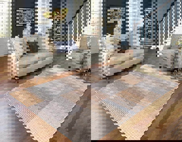 Aspre Shades Lines Rug in brown stripes, enhancing minimalist modern living room decor.