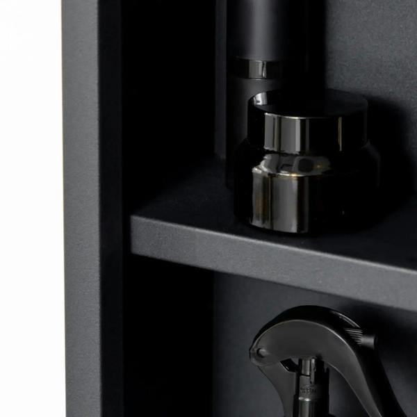 Black wall-mounted mirror cabinet corner with interior shelf edge detail