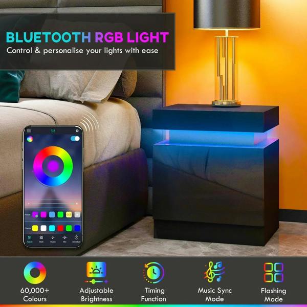 Black high-gloss LED bedside table with blue glowing light strip and smartphone nearby
