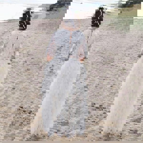 young flower girl on beach