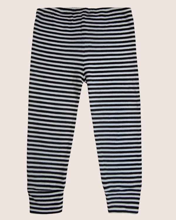 Humbug Stripe Legging made from GOTS certified organic cotton features black and white stripes, shown against a simple backdrop.