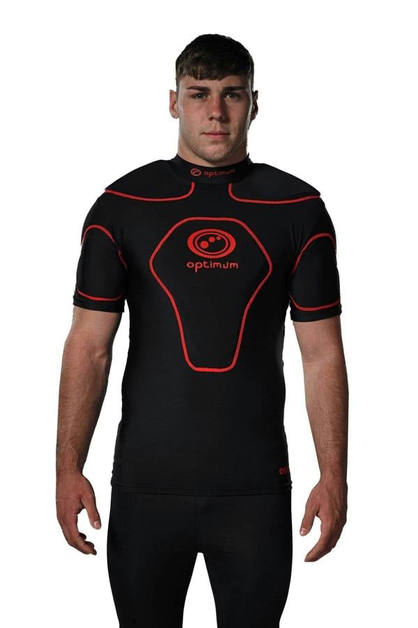 Man wearing black Optimum Origin rugby protective top with red trim and logo, front view - Optimum