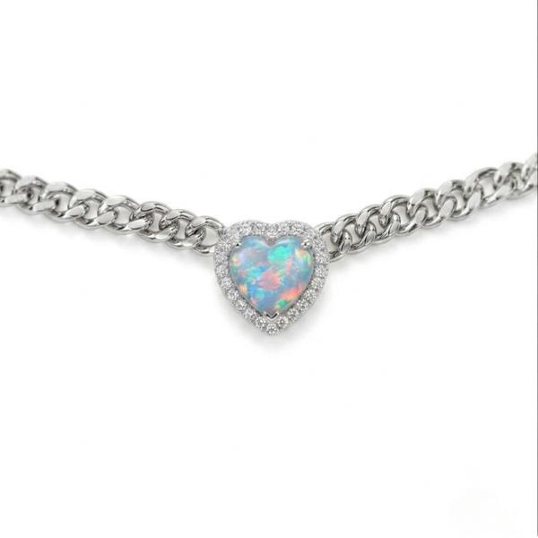 Necklace with a heart-shaped opal pendant on a white background