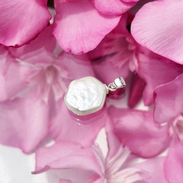 Baroque pearl in shape of hexagonal pendant charm by LENAE London.