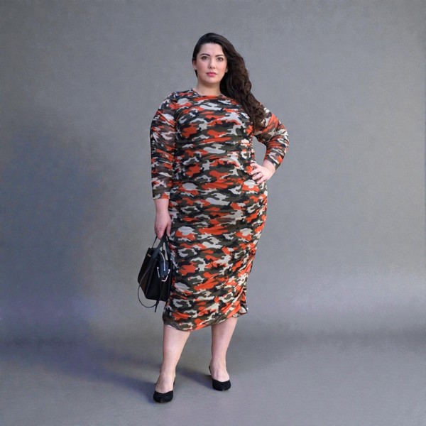 Women's Plus Size Orange Green Grey Camouflage Bodycon Midi Dress styled with a black handbag and black heels for a modern, stylish look.