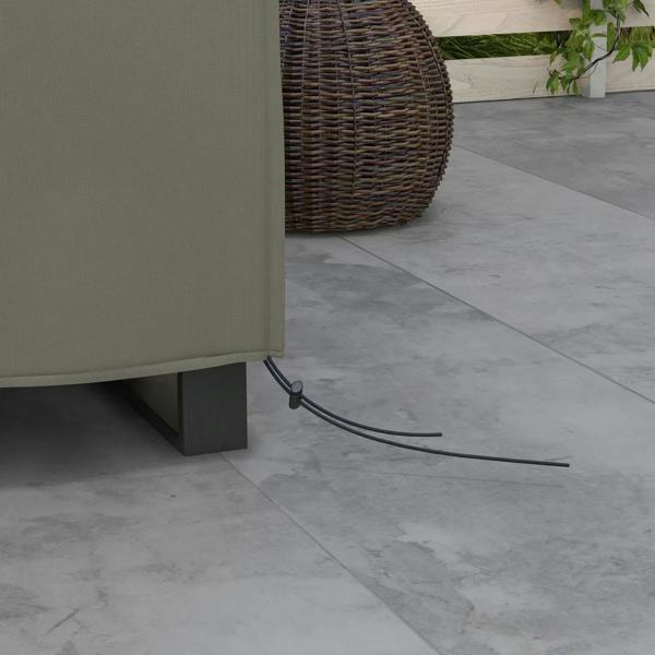 Grey patio furniture cover corner ties and elastic hem on outdoor patio