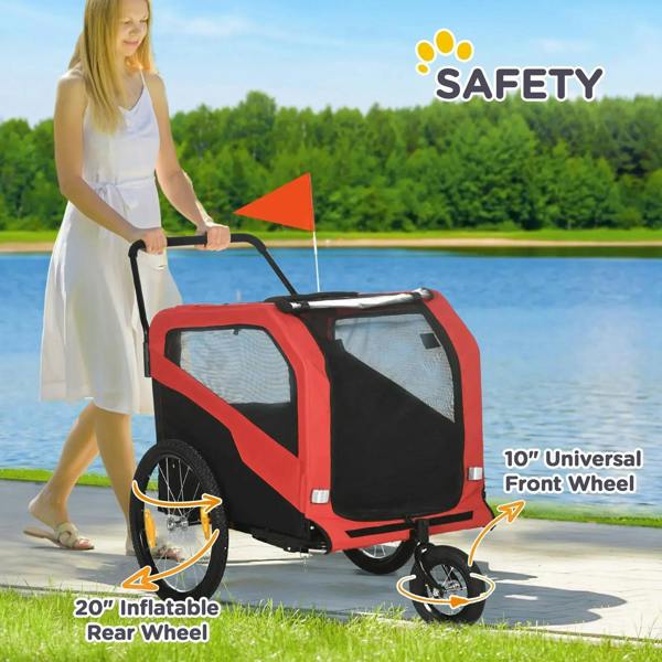 Red and black pet bike trailer with handlebar, front wheel, and rear inflatable wheel