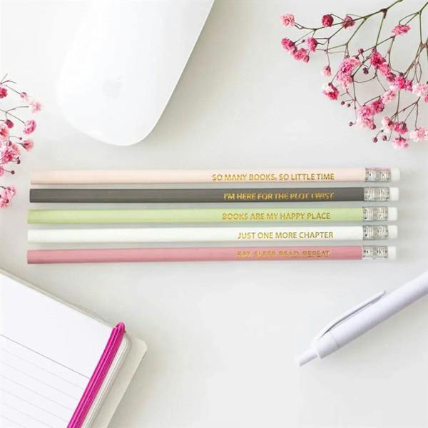 Five literature-inspired pencils with book quote text, pastel bodies, silver erasers