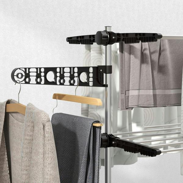 Black side arm with wave clips holding towels on a four-tier drying rack