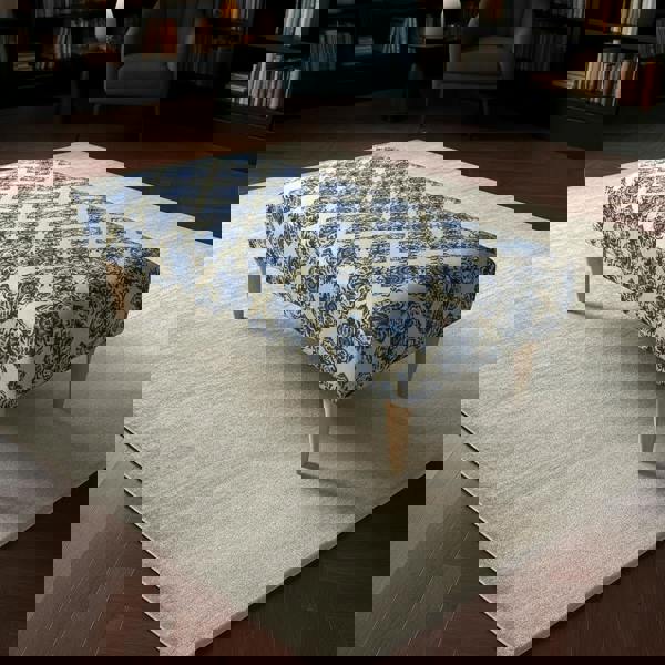 Stylish stitched detail footstool pouffe with premium cushioned lid for modern UK interiors