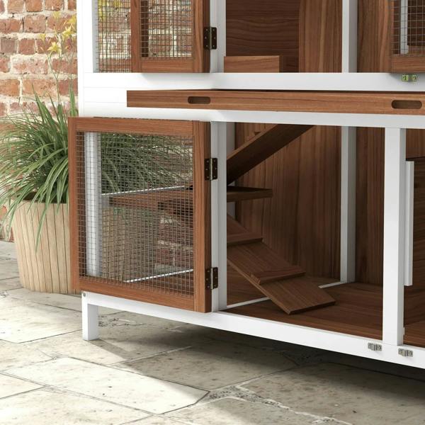 Two-tier wooden pet hutch side view with open door and interior wooden shelves