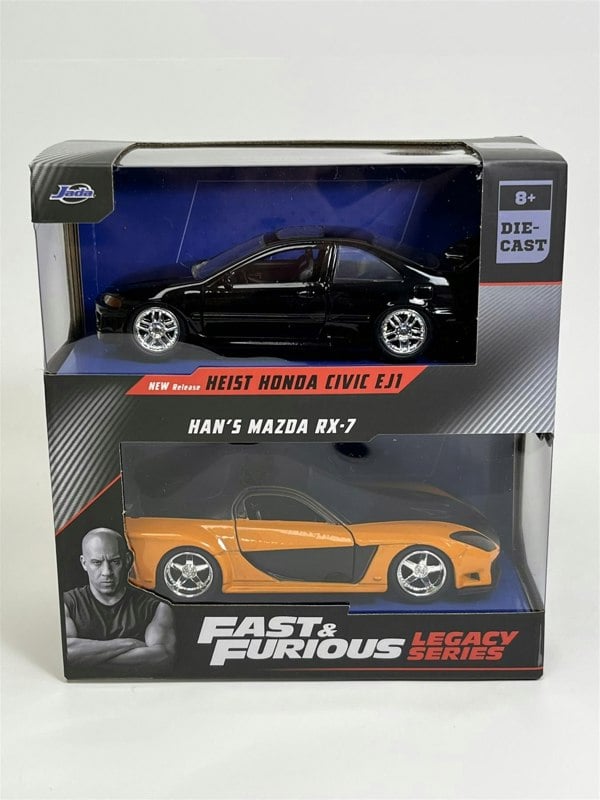 a black and orange toy cars in a box