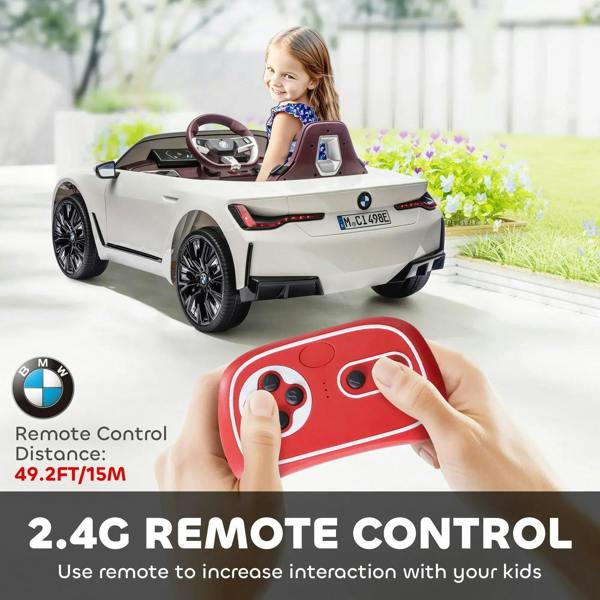 White kids electric ride-on car with remote control, child driving from rear seat.
