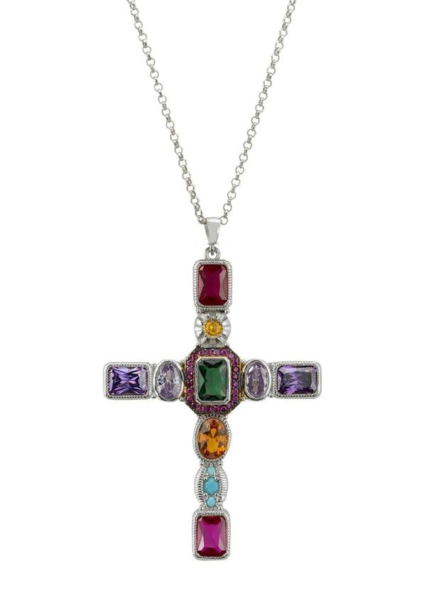 Cross-shaped pendant with colorful gemstones on a white background
