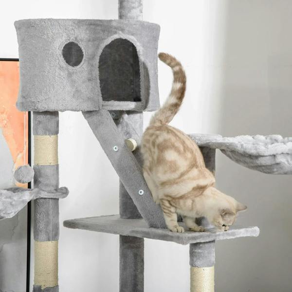 Light grey cat tree cube condo and ramp with sisal posts, featuring a cat on the side perch