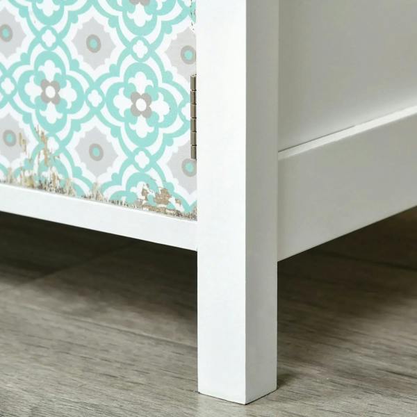 White sideboard cabinet corner leg with close-up of patterned drawer panel