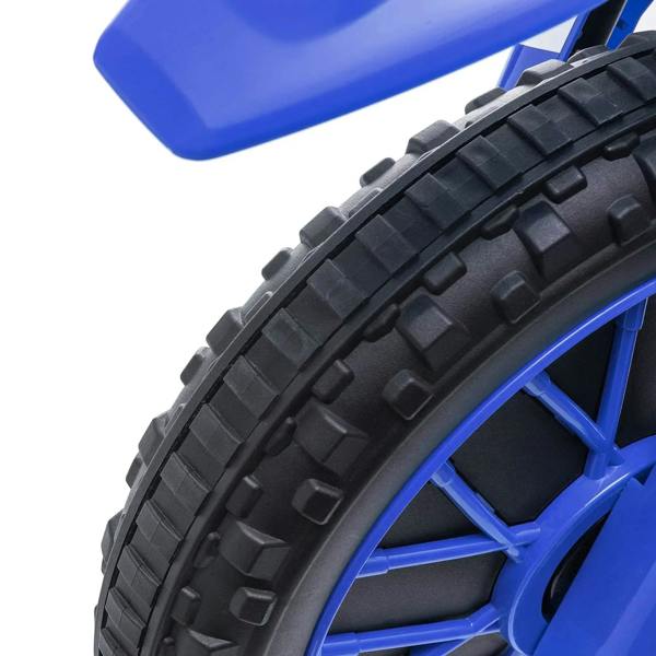 Close-up of blue wheel and black tread tire for kids electric ride-on motorcycle