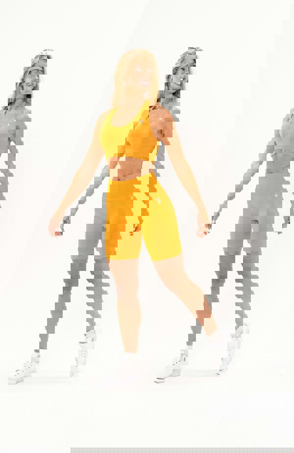 V3 Apparel Women's seamless Limitless high waisted cycle shorts in orange – Squat proof 5 inch inseam leg bum enhancing shorts for Gym workouts training, Running, yoga, bodybuilding and bikini fitness.