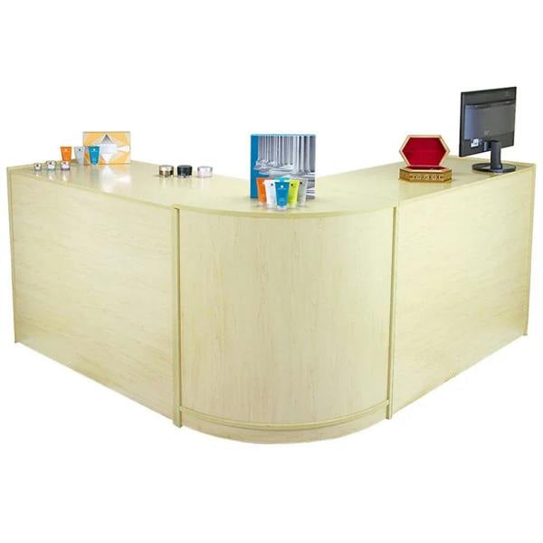 Zodiac Maple Shop Counter features a light maple finish, curved edges, and ample space for retail displays and a monitor