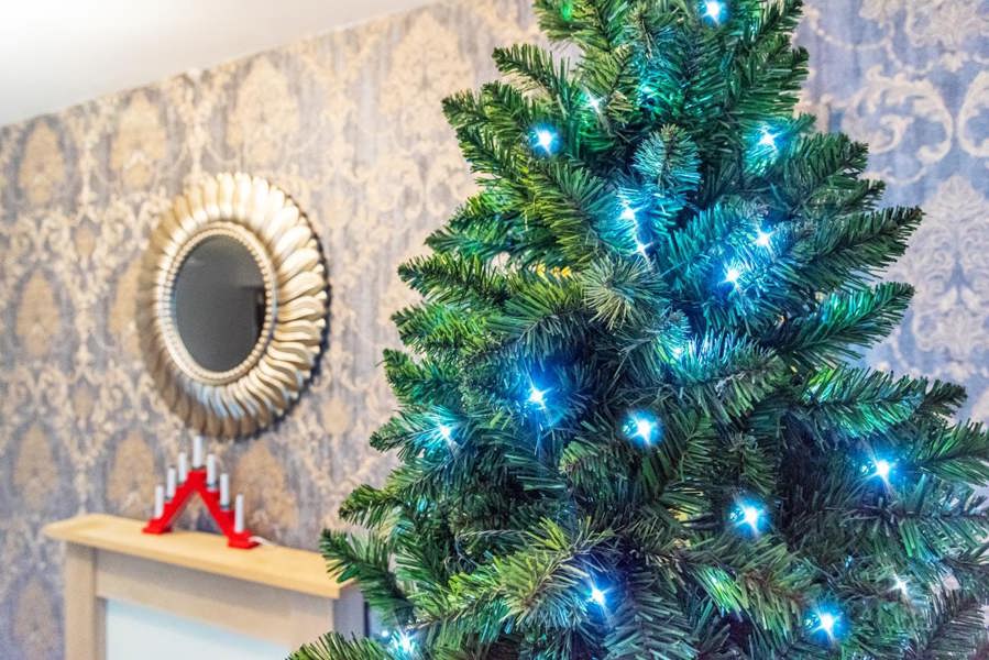 8ft Pre-Lit Green Imperial Pine Artificial Christmas Tree with Hinged Branches and Metal Stand image 9