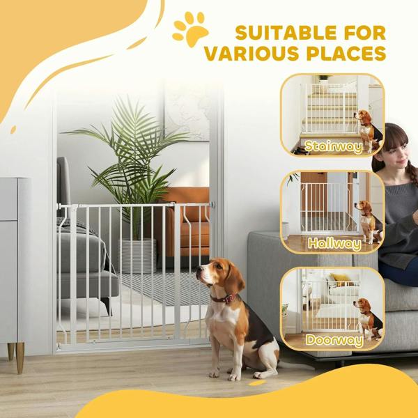 White pet safety gate in a hallway with a dog behind the vertical bars