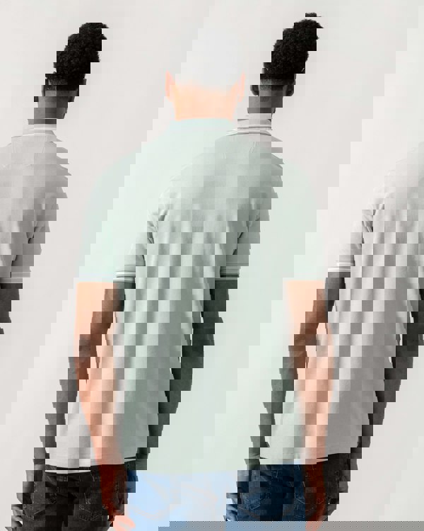 Model wearing BOSS Green Mens Paddy Cotton-Piqué Polo Shirt with Contrast Logo in Turquoise/Aqua 448 - Back