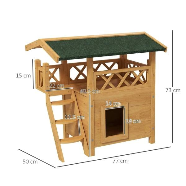 Outdoor wooden cat house with green felt roof, balcony lattice railing, and square front door